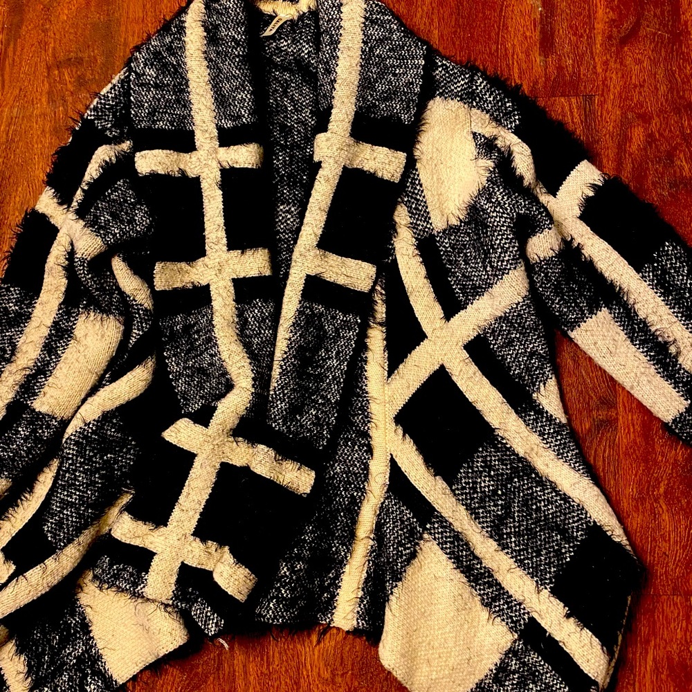 Fuzzy cardigan sweater. Size S-M. Black and oatmeal color.